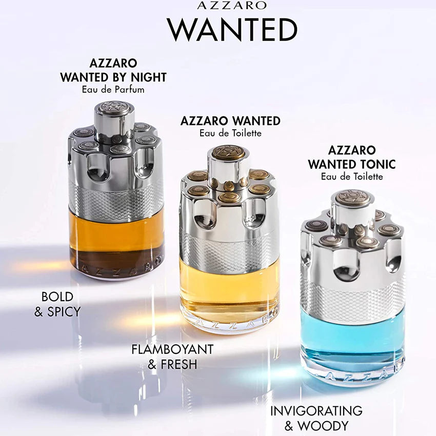 Three Azzaro Wanted perfume bottles with different scents on a white background