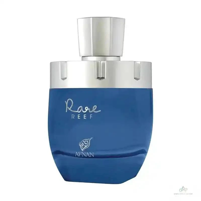 Blue perfume bottle with silver cap on a white background