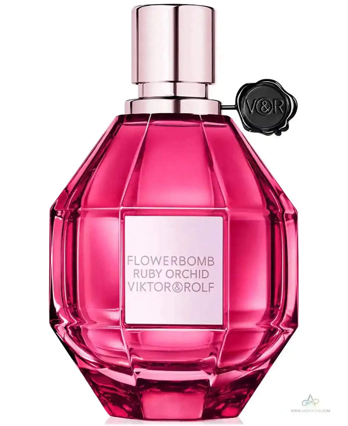 Pink perfume bottle with silver cap and white label on a white background