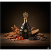 Luxury bottle of brandy with vanilla beans and amber candies on a wooden surface