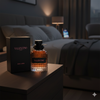 Valentino perfume bottle and packaging on a nightstand in a dimly lit bedroom.