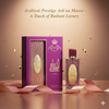 Arabiyat Prestige Ash'aa Mauve perfume bottle and packaging on a beige background