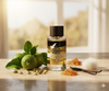Ayen perfume bottle on a wooden surface with limes, vanilla beans, and flowers.