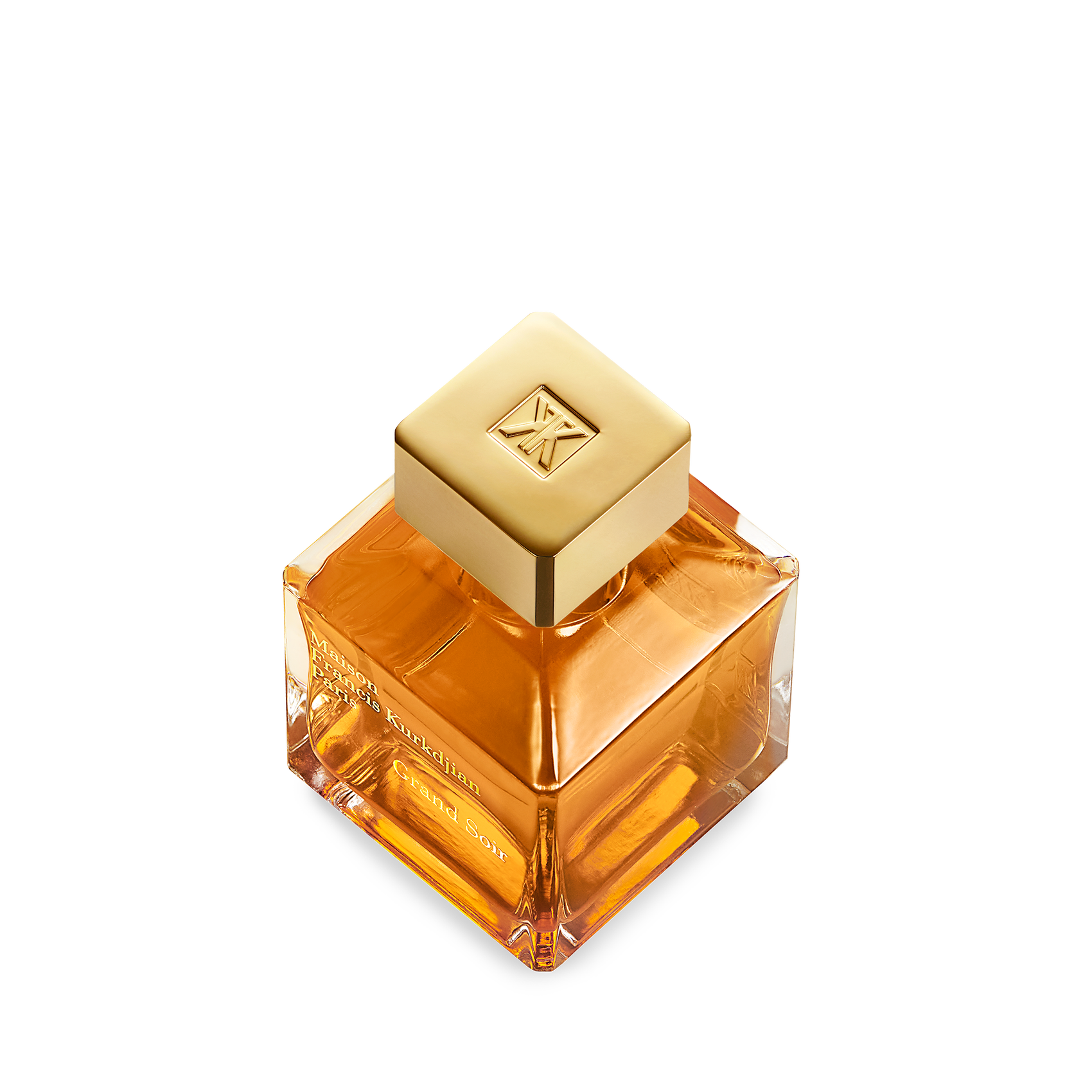 Grand Soir by Maison Francis Kurkdjian luxury amber vanilla unisex perfume bottle with warm golden lighting