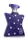 Blue perfume bottle with star patterns and Bond No. 9 NYC logo on a white background