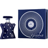 Navy blue perfume bottle with star design and matching packaging on a white background