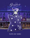 Blue perfume bottle with star design against a cityscape background, featuring Bond No. 9 branding.