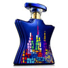 Blue perfume bottle with colorful design and 'New York' text on a white background