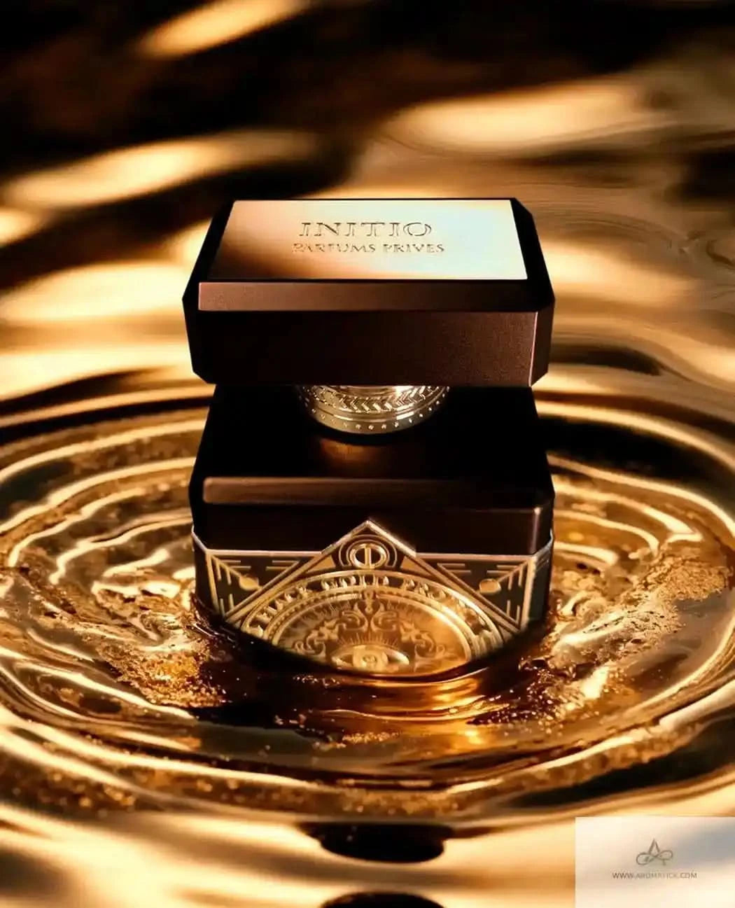 Initio Oud For Greatness perfume bottle displayed on golden liquid ripples, highlighting its luxurious and aromatic essence.