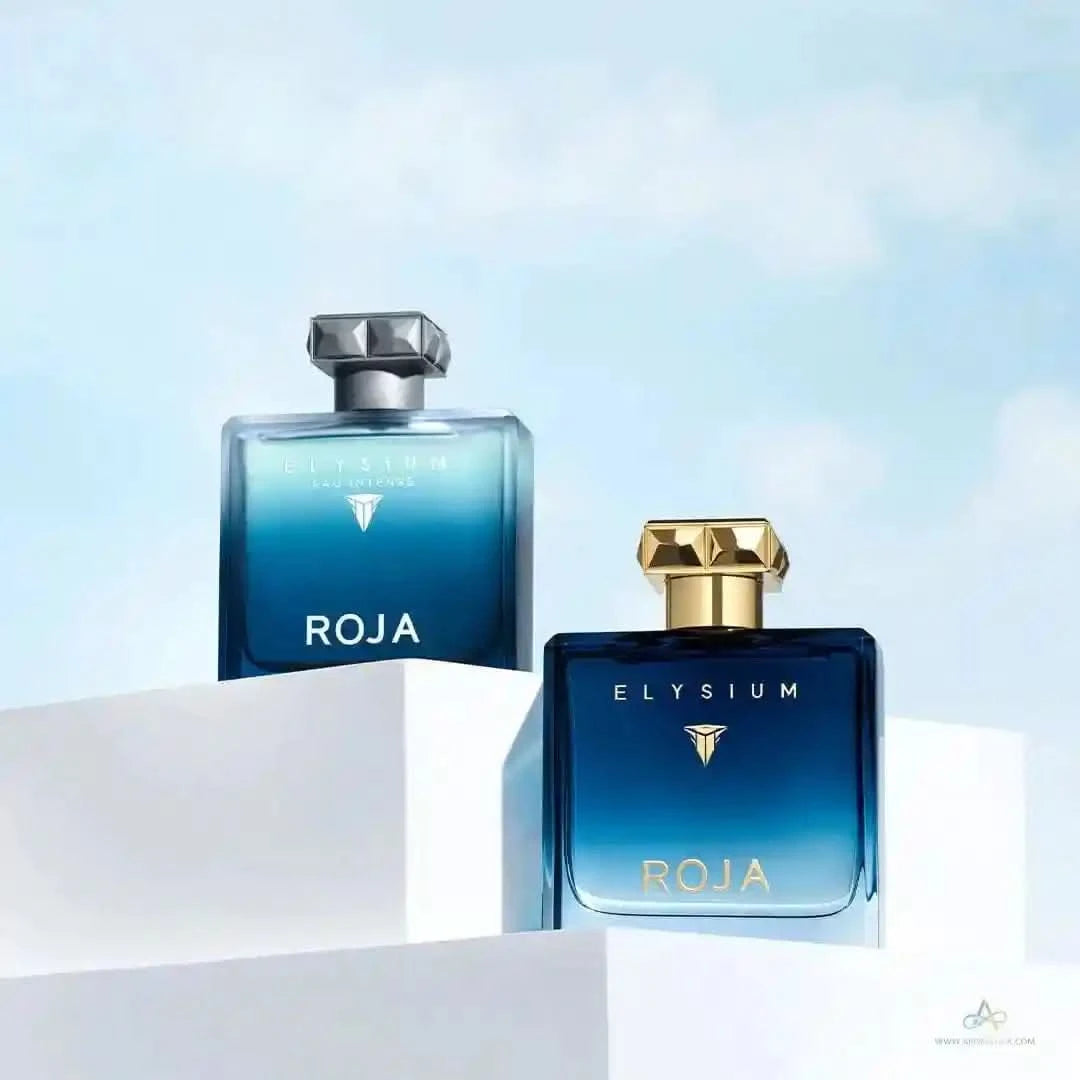 Roja Elysium Extrait and Elysium Pour Homme Parfum Cologne displayed on white podiums under a blue sky, highlighting luxury men's fragrances.