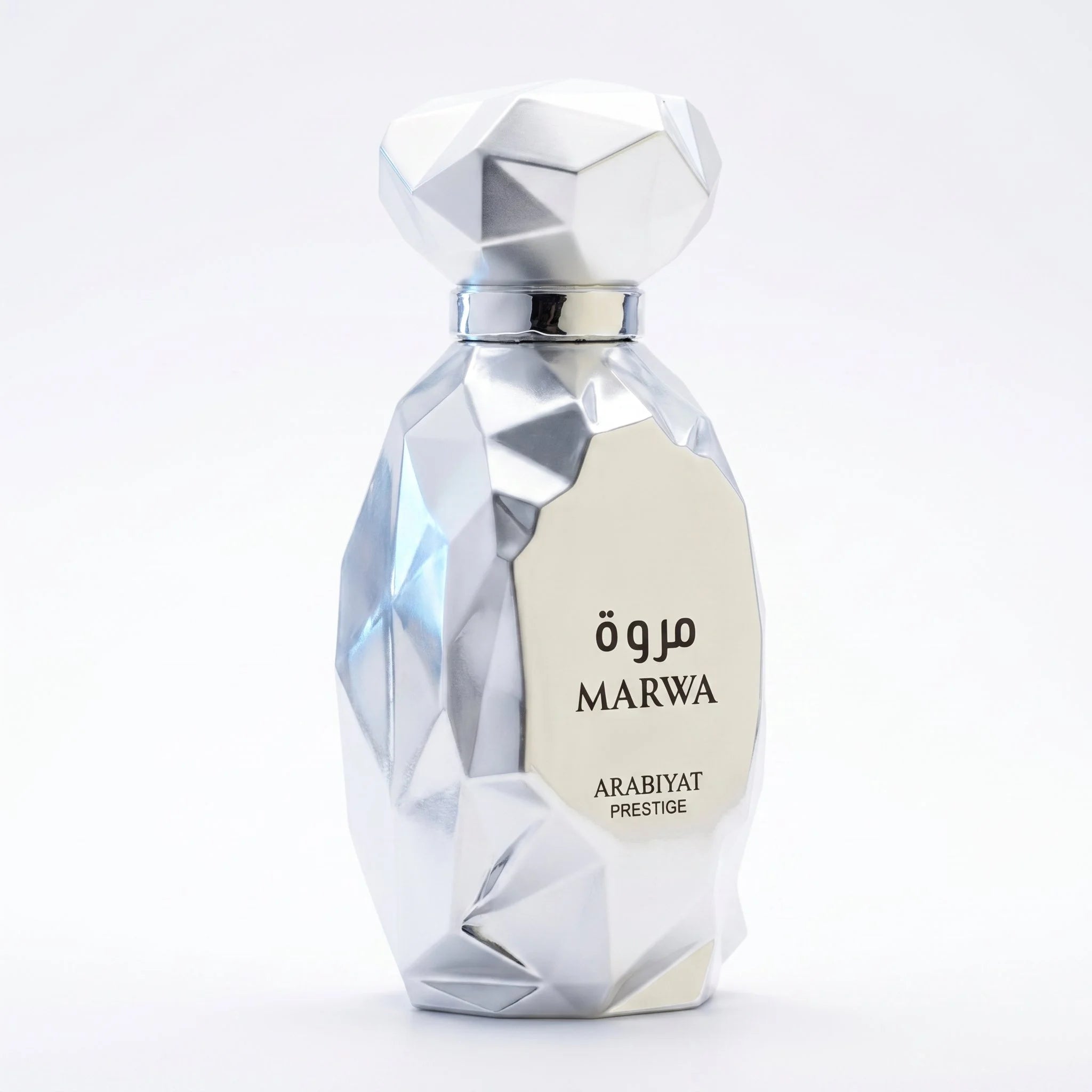 Arabiyat Prestige Marwa silver geometric faceted EDP bottle on white background, full bottle view