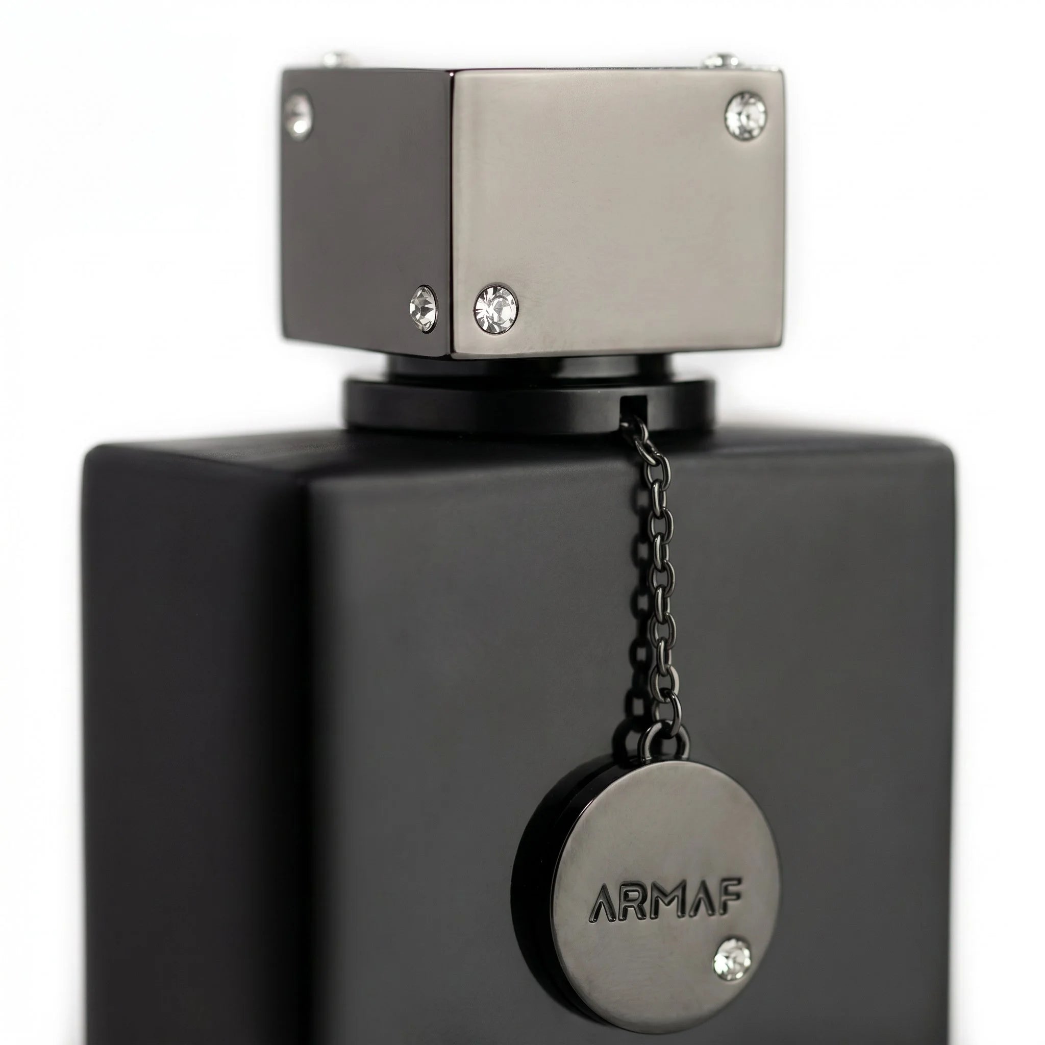 Armaf Club de Nuit Intense Man matte black EDT bottle with gunmetal cube cap and Armaf medallion on white