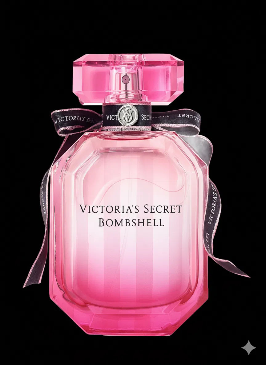 Pink Victoria's Secret Bombshell perfume bottle on a black background