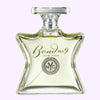 Perfume bottle labeled 'Bond No. 9 New York' on a light pink background