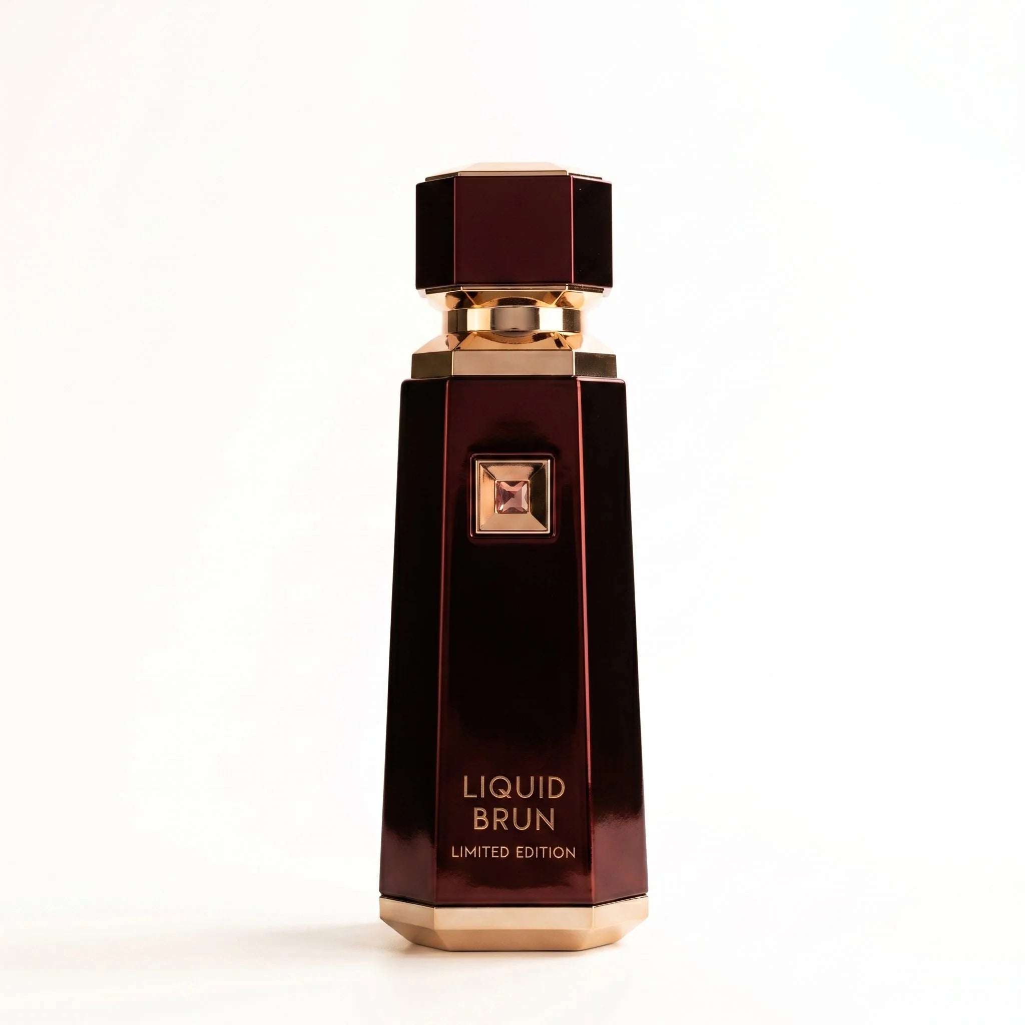 French Avenue Liquid Brun Limited Edition burgundy hexagonal bottle on white background luxury extrait de parfum product photography