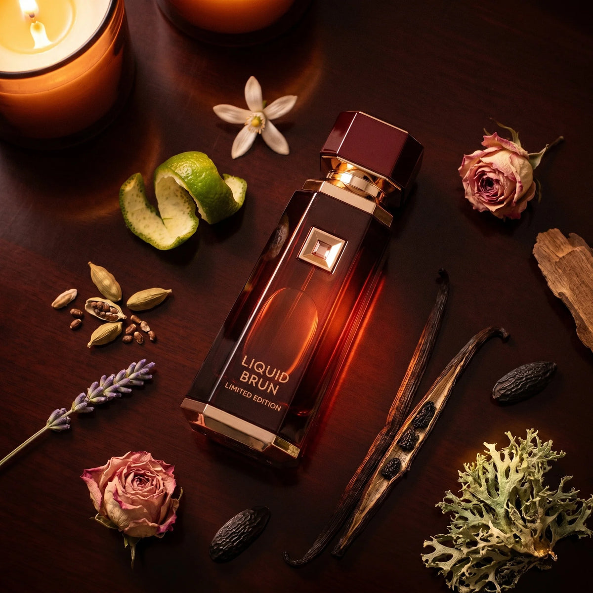 French Avenue Liquid Brun Limited Edition bottle on dark mahogany with cardamom lavender orange blossom rose vanilla amber oakmoss fragrance notes flatlay