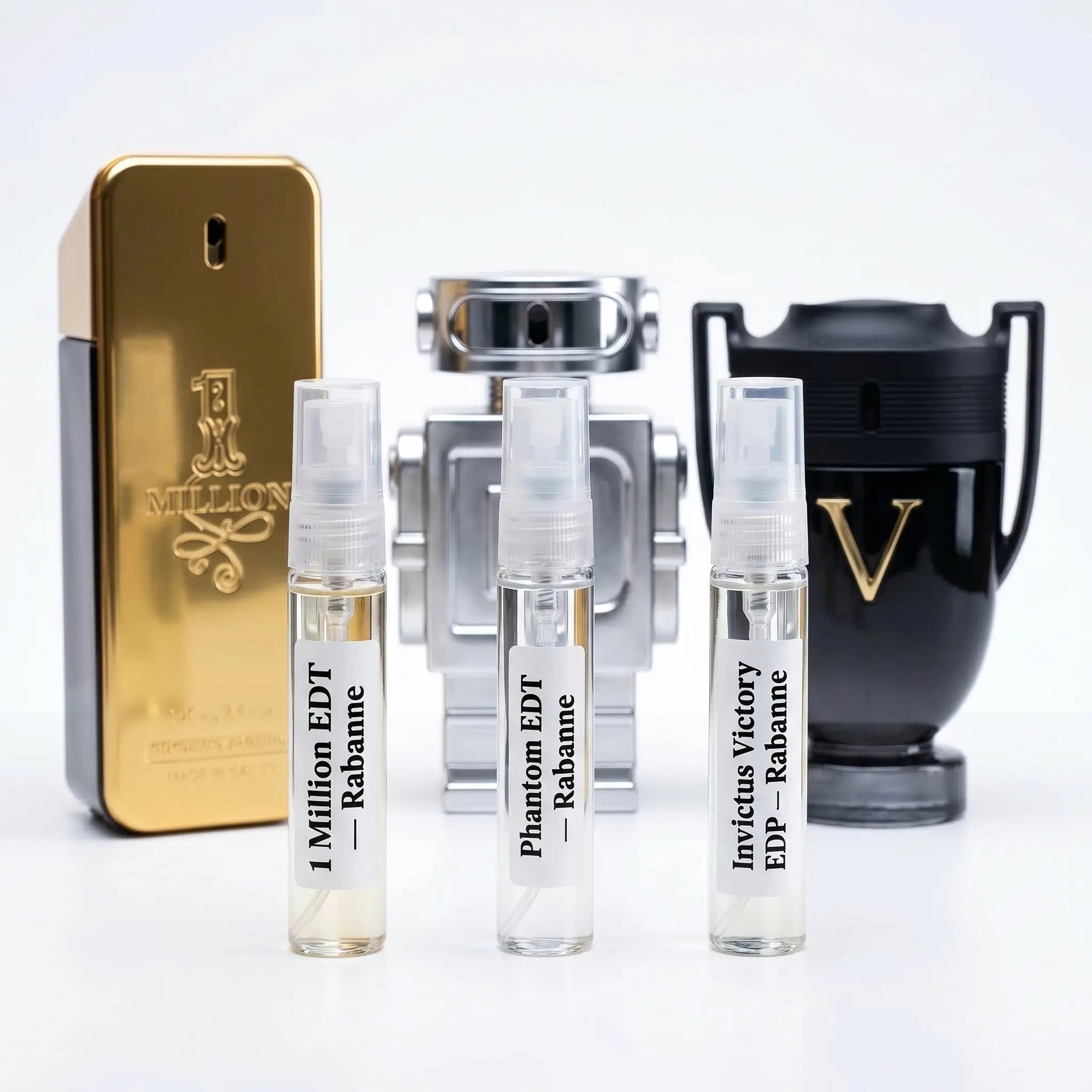 Old Spice Upgrade hero — Rabanne 1 Million, Phantom EDT and Invictus Victory bottles with 5ml decants