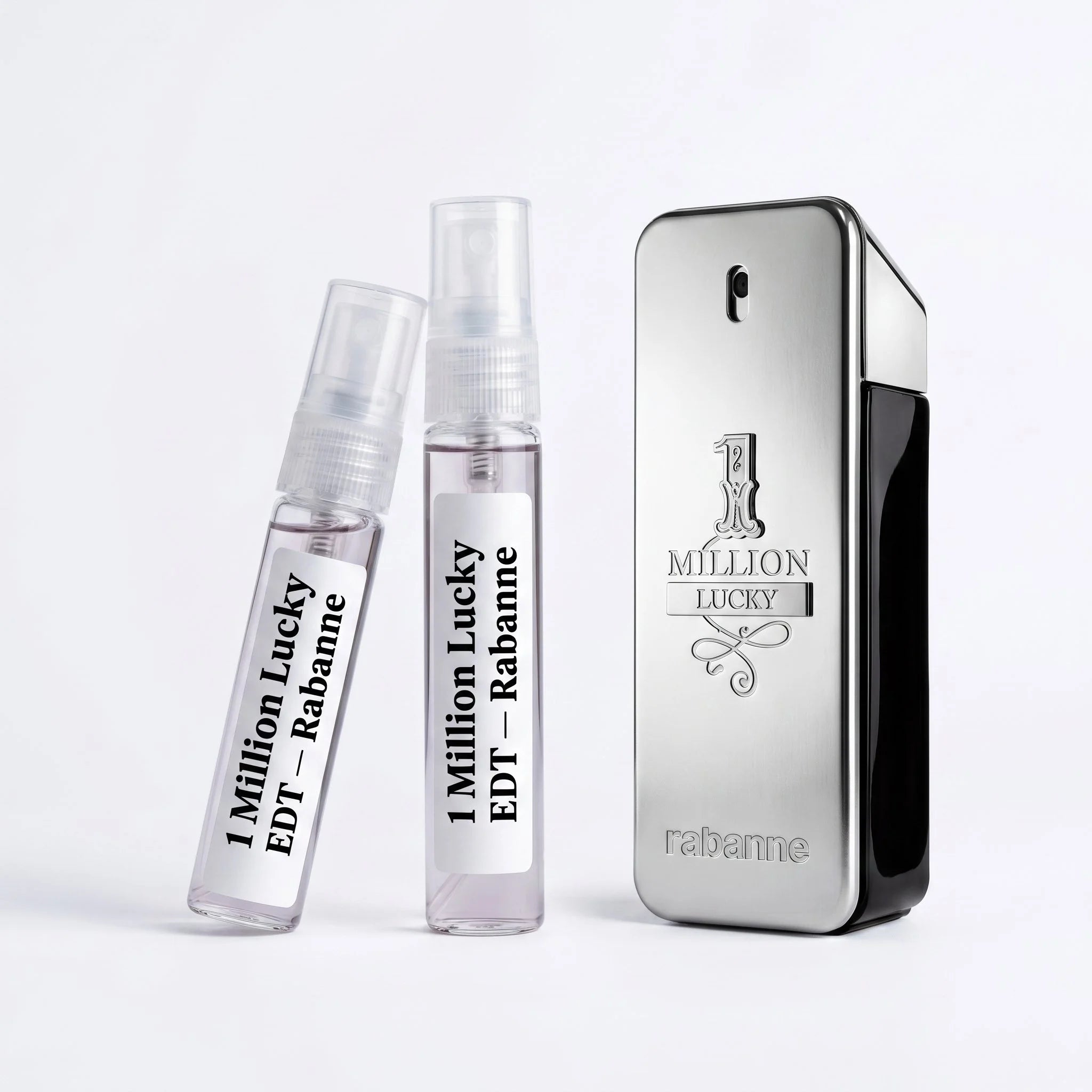 Rabanne 1 Million Lucky EDT decant vials with silver chrome bottle on white background luxury fragrance photography