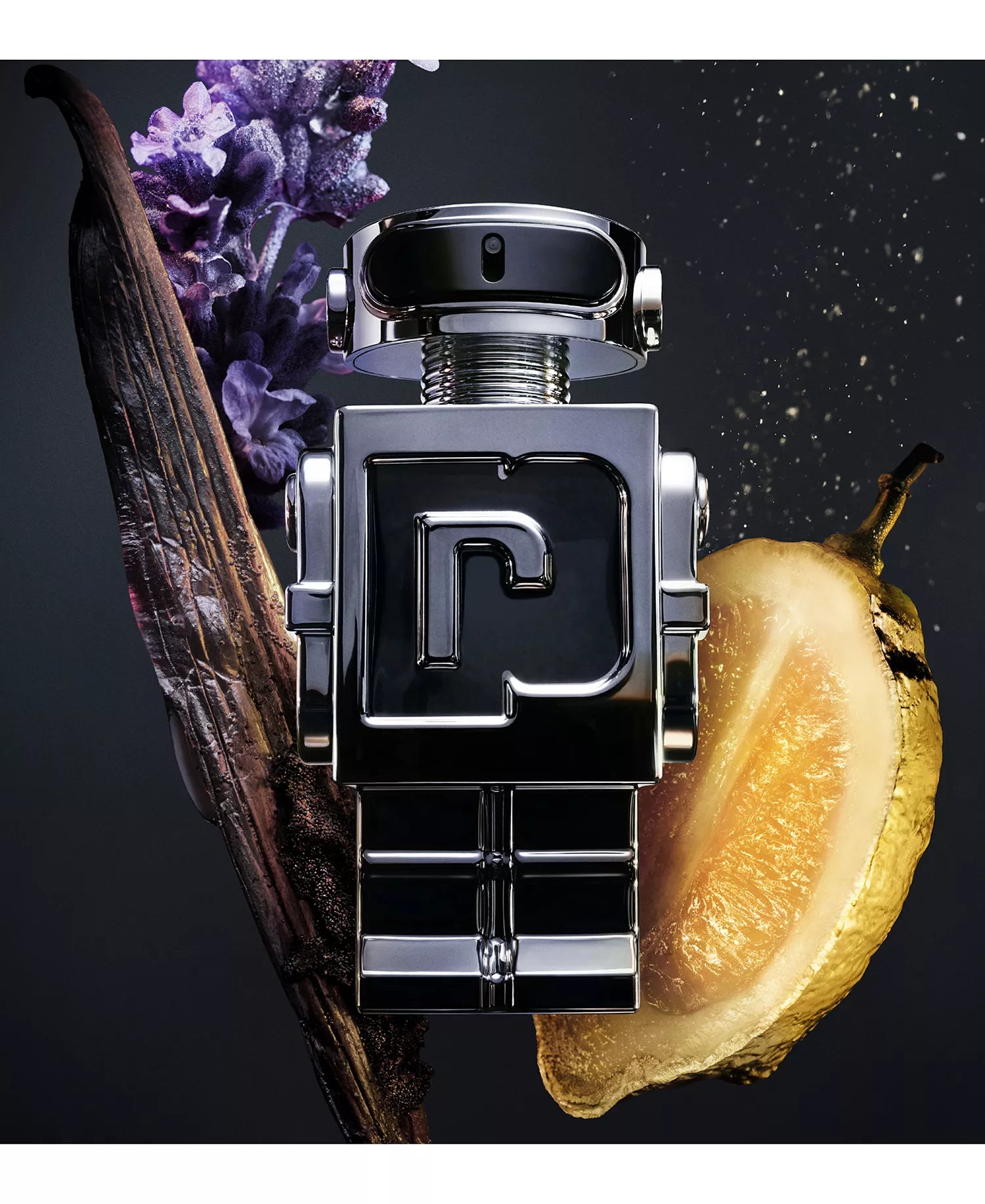 Perfume bottle with floral and fruit elements on a dark background