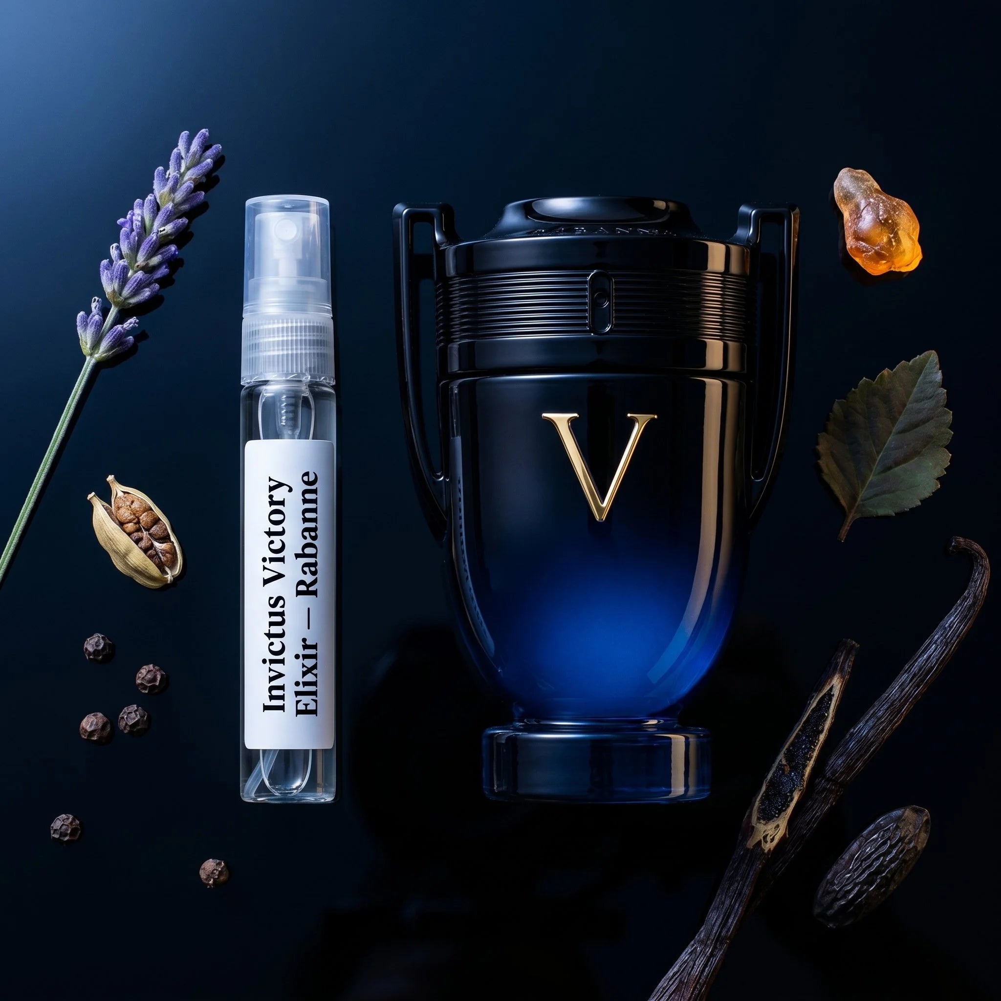 Rabanne Invictus Victory Elixir bottle and decant on midnight black surface with lavender cardamom incense vanilla tonka bean fragrance notes flatlay