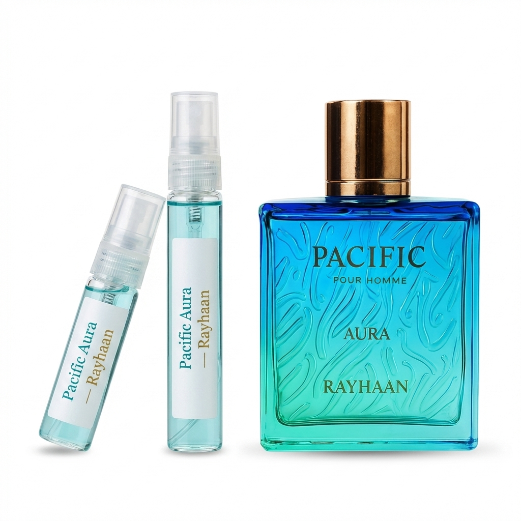 Two smaller bottles and a larger blue bottle of Pacific Aura Rayhaan perfume on a white background