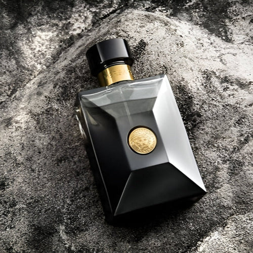Versace Pour Homme Oud Noir men's cologne bottle with geometric black glass design and gold Medusa emblem - authentic designer perfume