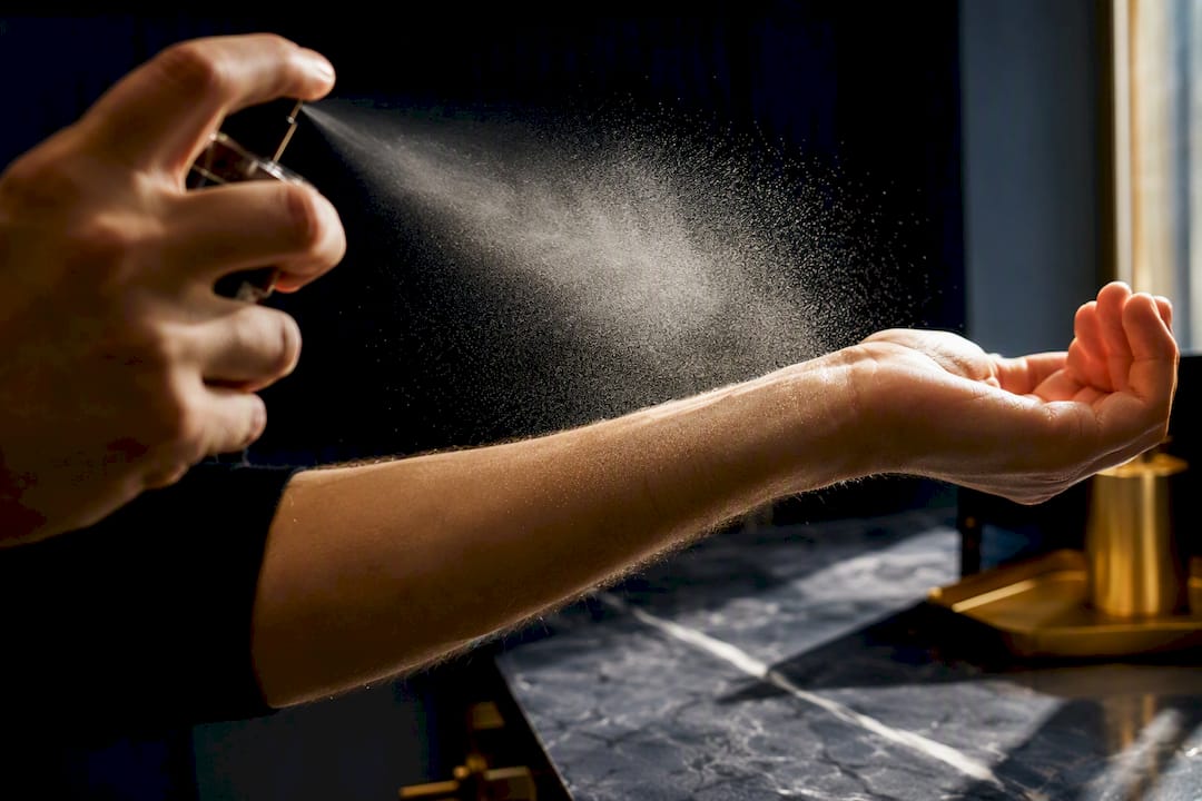 Fine perfume mist applied at proper distance