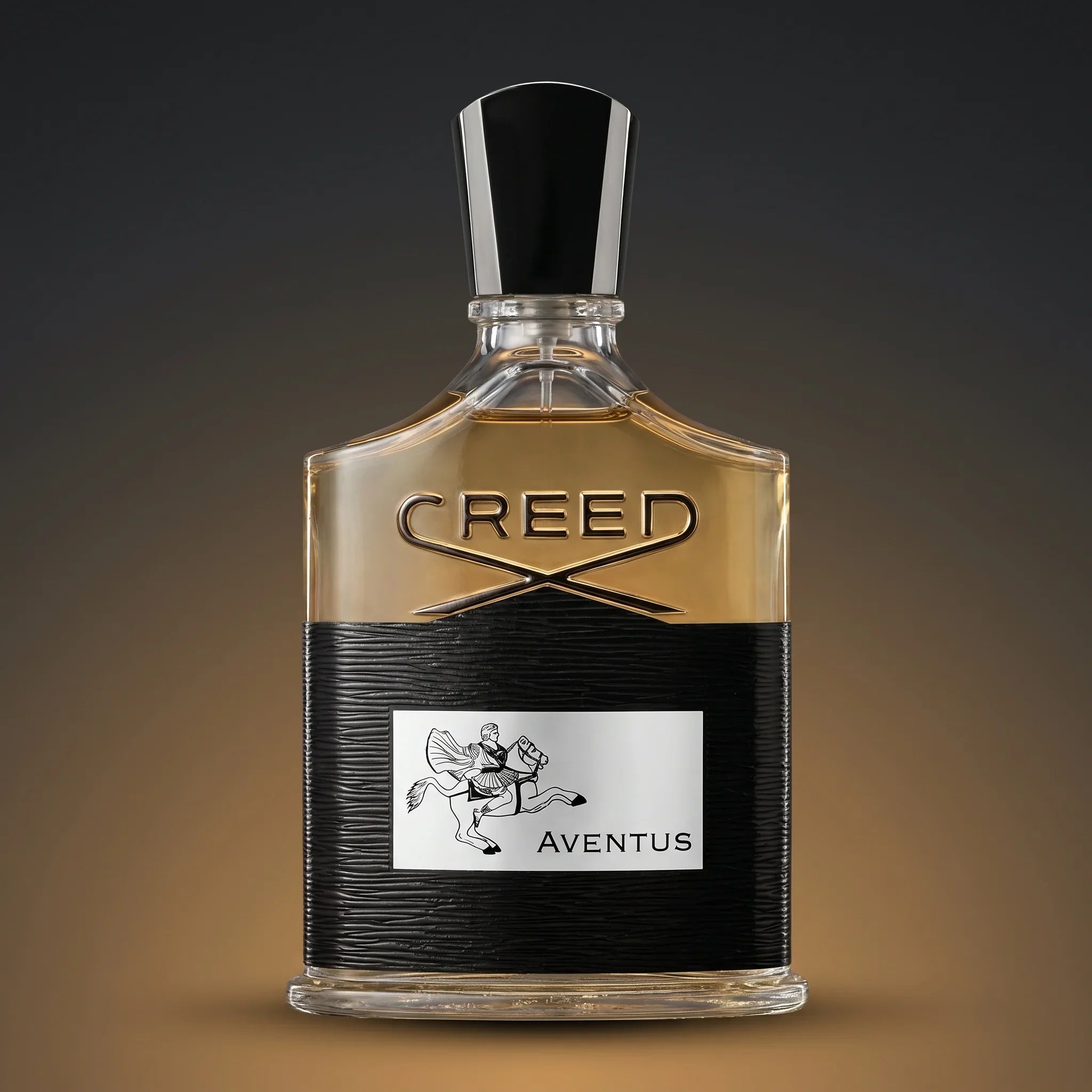 Creed Aventus 3.4 oz Eau de Parfum bottle — tall flask with golden-amber juice, black leather wrap, black cap with silver collar and horse-and-rider Aventus label on a charcoal-to-amber backdrop