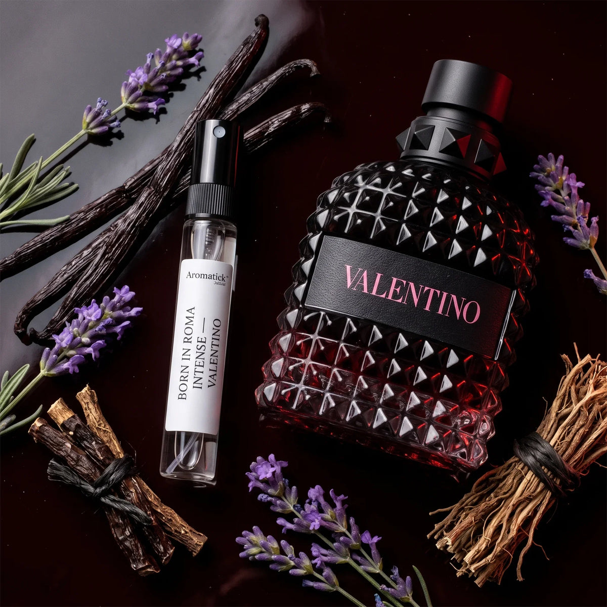 Valentino Born in Roma Intense flatlay with vanilla pods, lavandin sprigs and vetiver roots