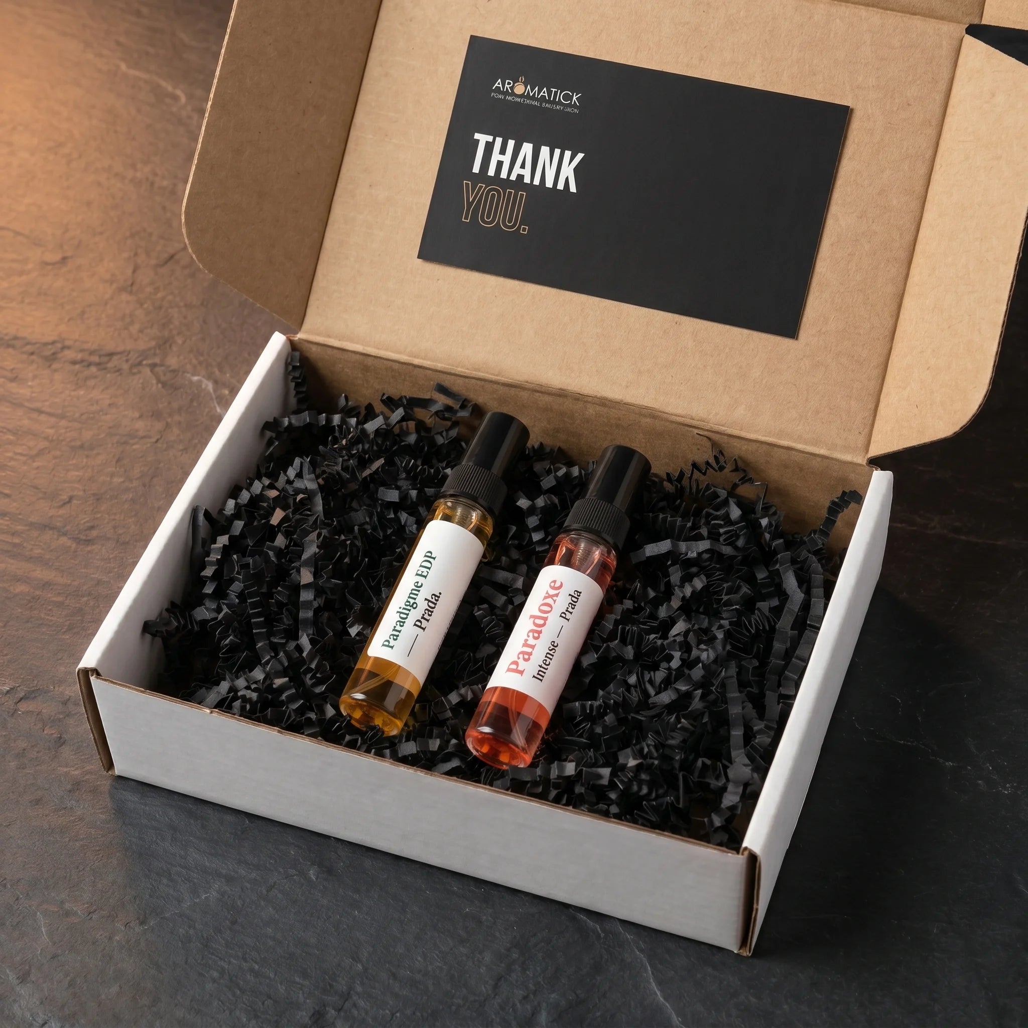 Aromatick Prada His & Hers Discovery Set unboxing — Paradigme and Paradoxe Intense 5ml decants in the kraft mailer with the Aromatick thank-you card