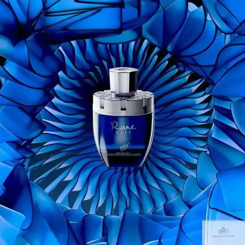 Blue perfume bottle with silver cap on a blue abstract background