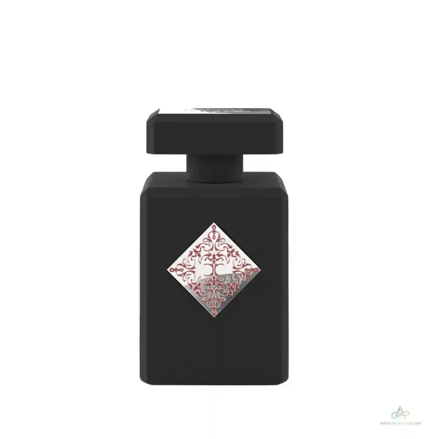 Black perfume bottle with decorative label on a white background