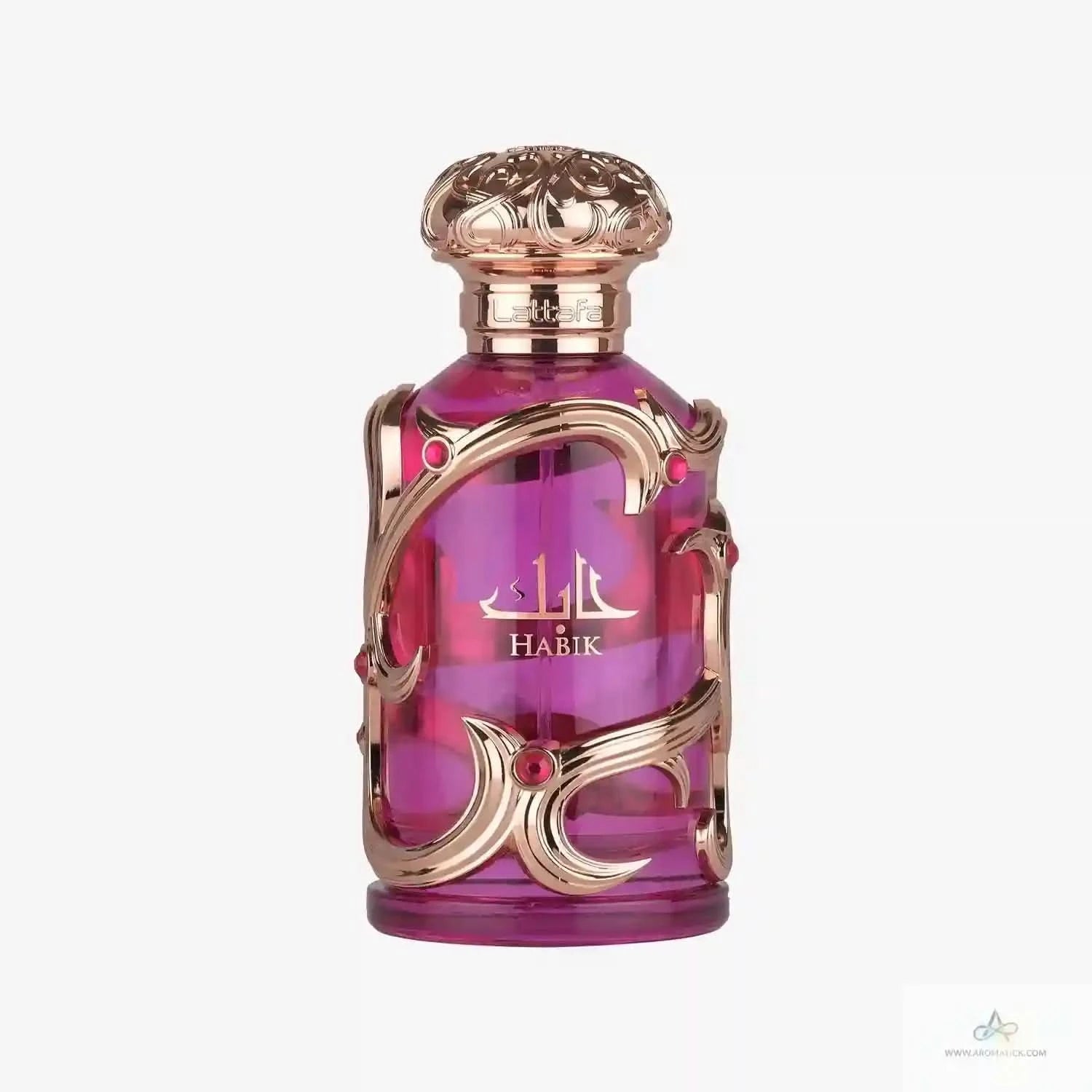Pink perfume bottle with gold accents on a white background