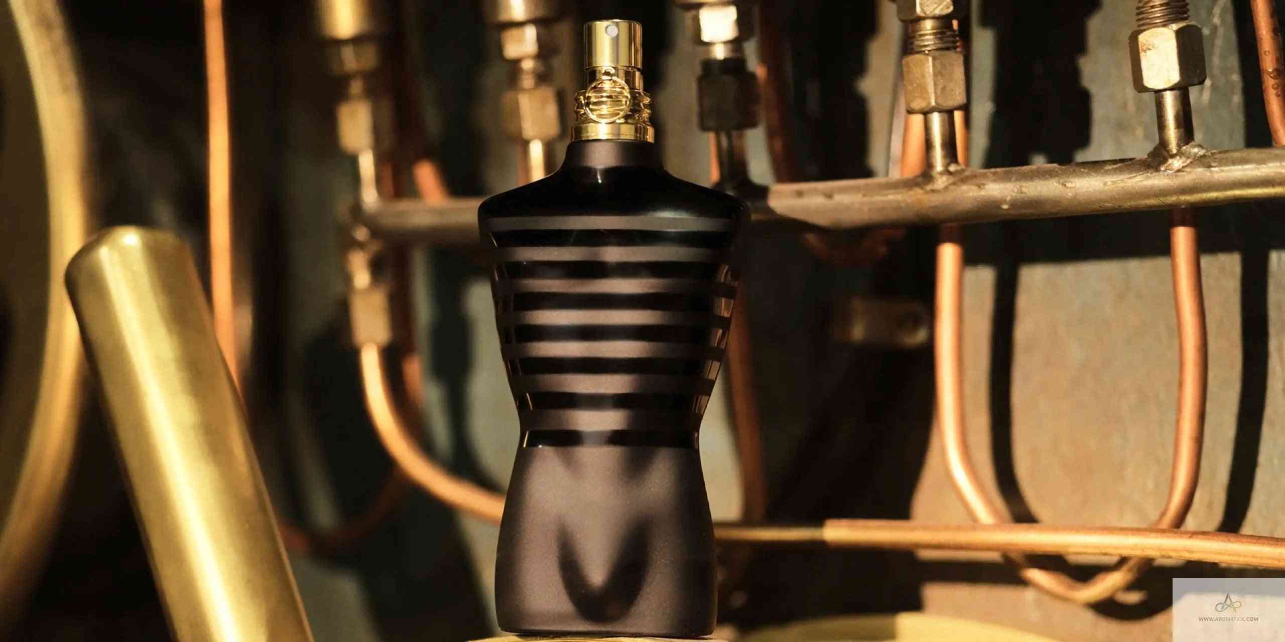 Le Male Le Parfum - Aromatick cologne bottle placed in an industrial setting, highlighting its masculine and intense scent profile.