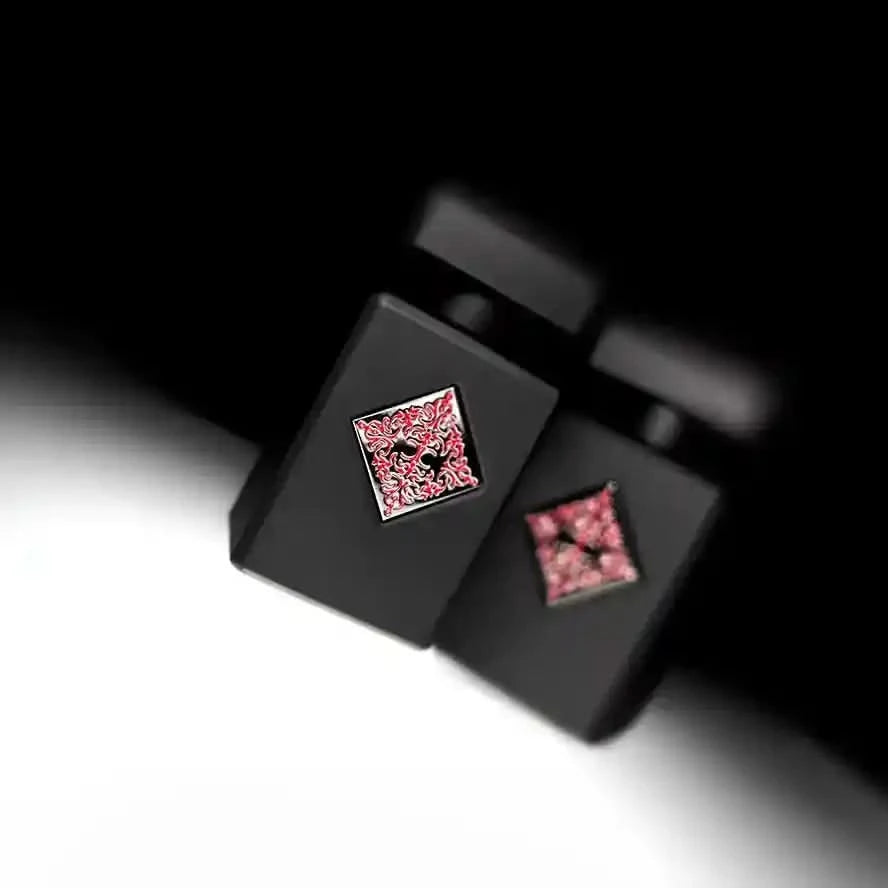 Artistic display of Initio Mystic Experience EDP bottle with mirrored reflection, highlighting its elegant design and niche fragrance appeal.