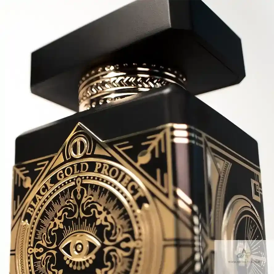Detailed view of Initio Oud For Greatness perfume cap and neck design, showcasing elegant craftsmanship and opulent gold accents.