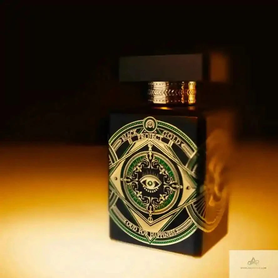 Decorative box with intricate design and gold accents on a dark background