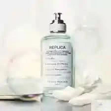 Replica Bubble Bath EDT by Maison Margiela displayed with delicate bubbles and floral accents, ideal for women seeking a fresh, comforting fragrance.