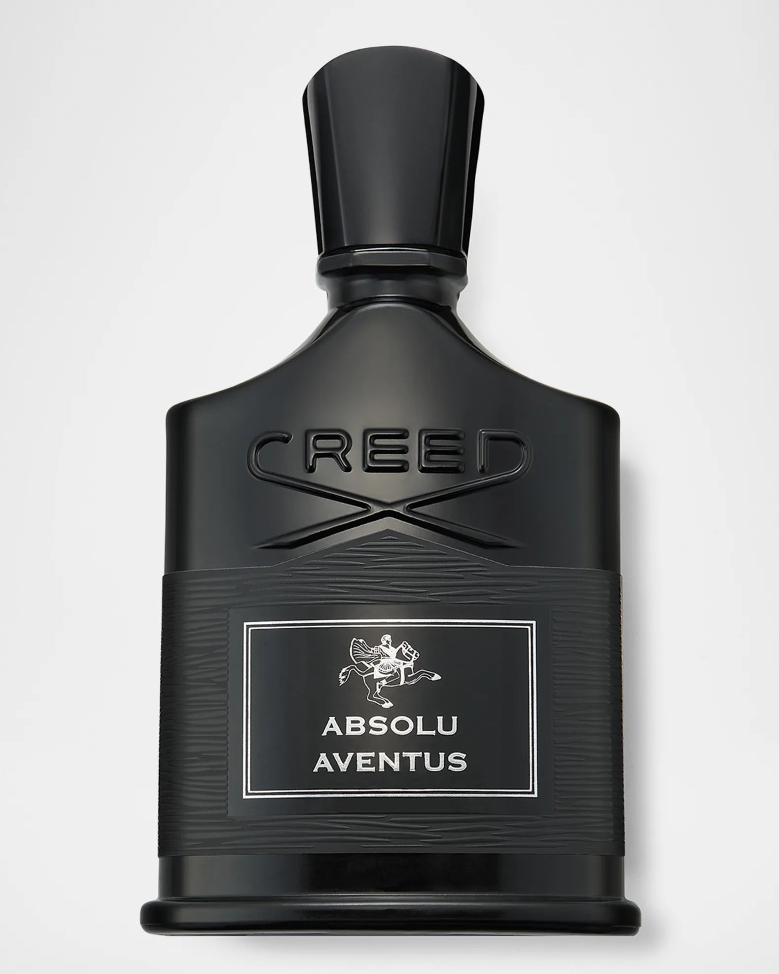 Black Creed Absolu Aventus perfume bottle on a light gray background