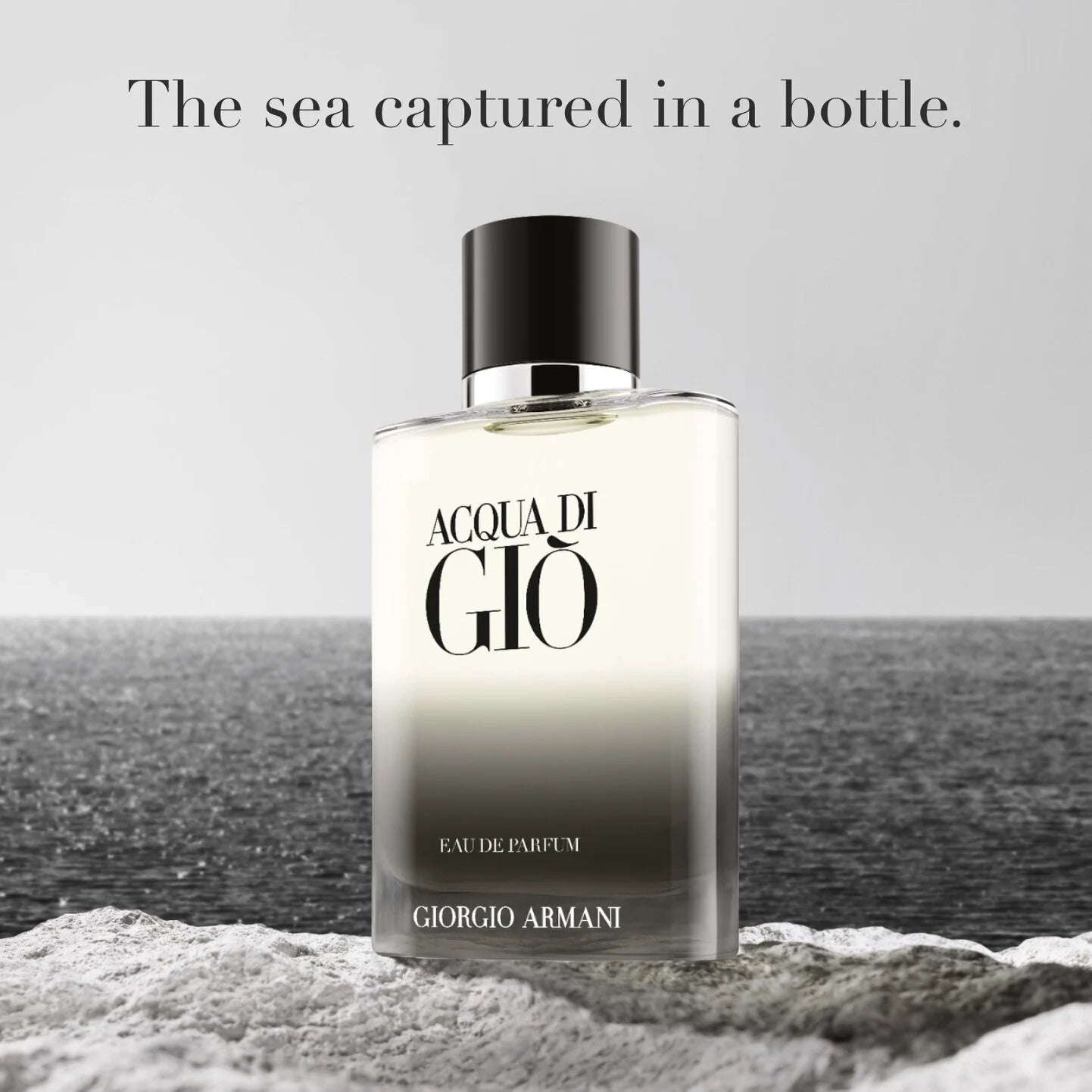 Giorgio Armani Acqua di Gio perfume bottle with ocean background
