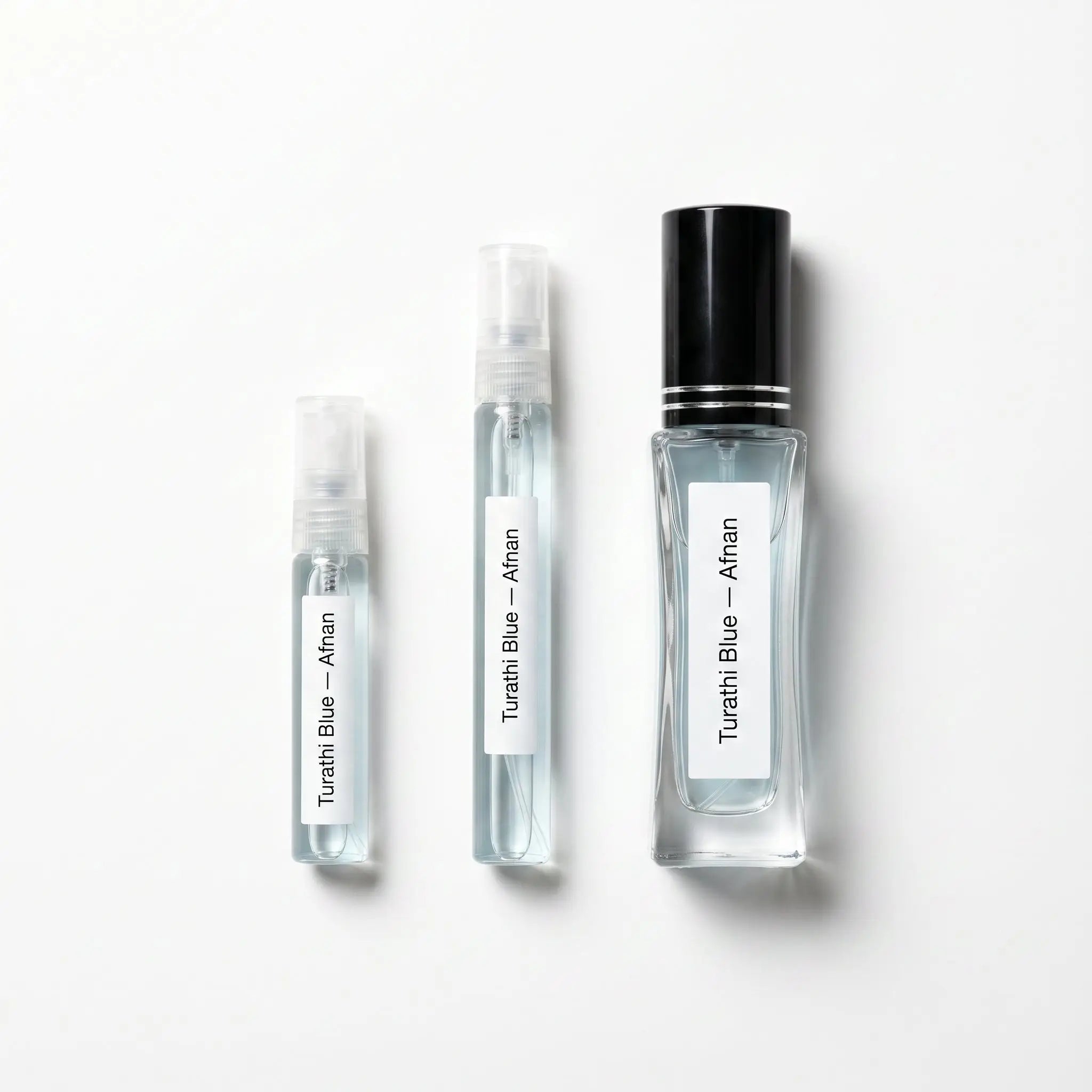 Afnan Turathi Blue decant sizes 5ml 10ml and 30ml on white background
