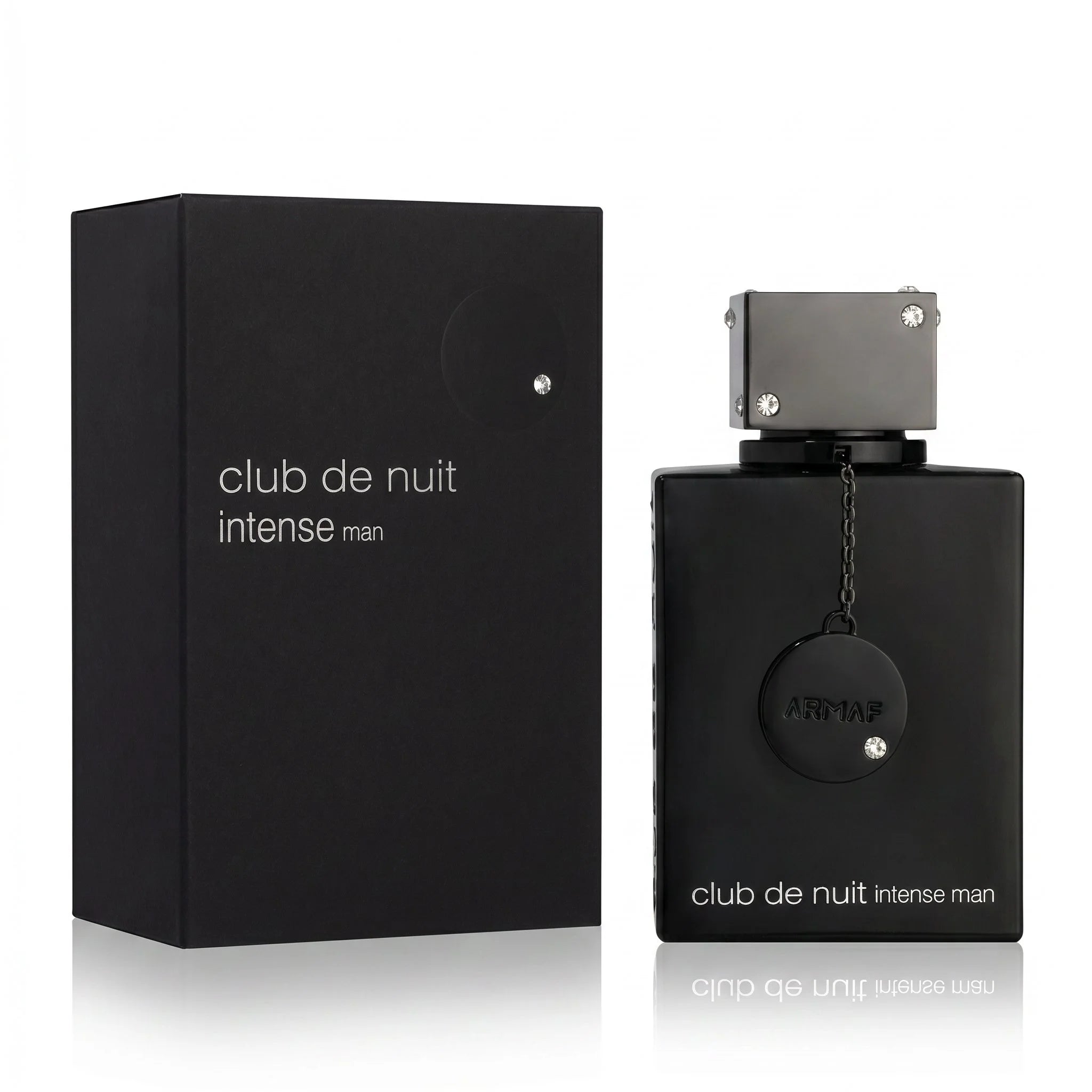 Armaf Club de Nuit Intense Man EDT bottle with matte black box, crystal-studded cube cap on white background
