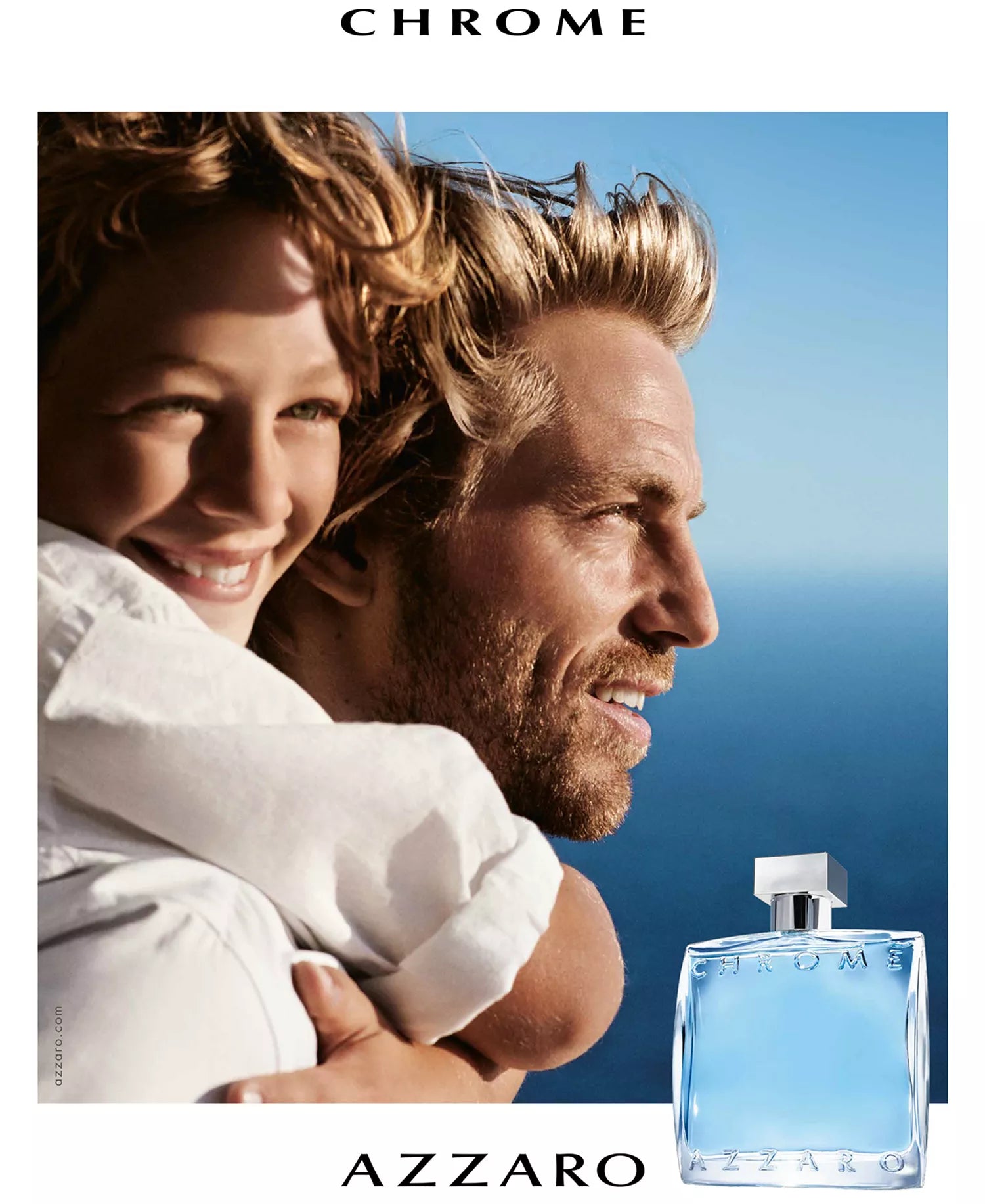 Advertisement for Azzaro Chrome perfume with a couple embracing against a blue sky.