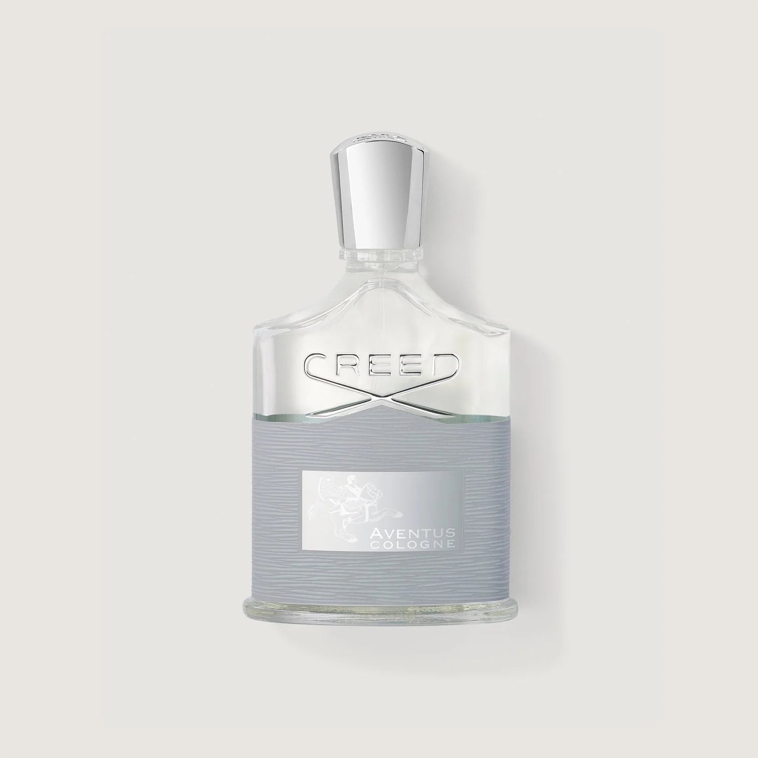 Creed Aventus perfume bottle on a light gray background