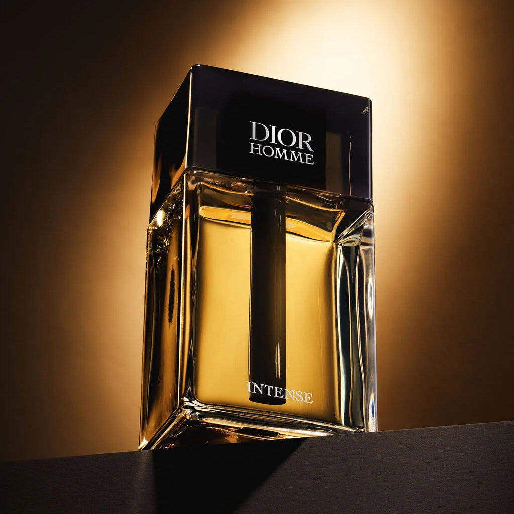Dior Homme Intense perfume bottle on a dark background