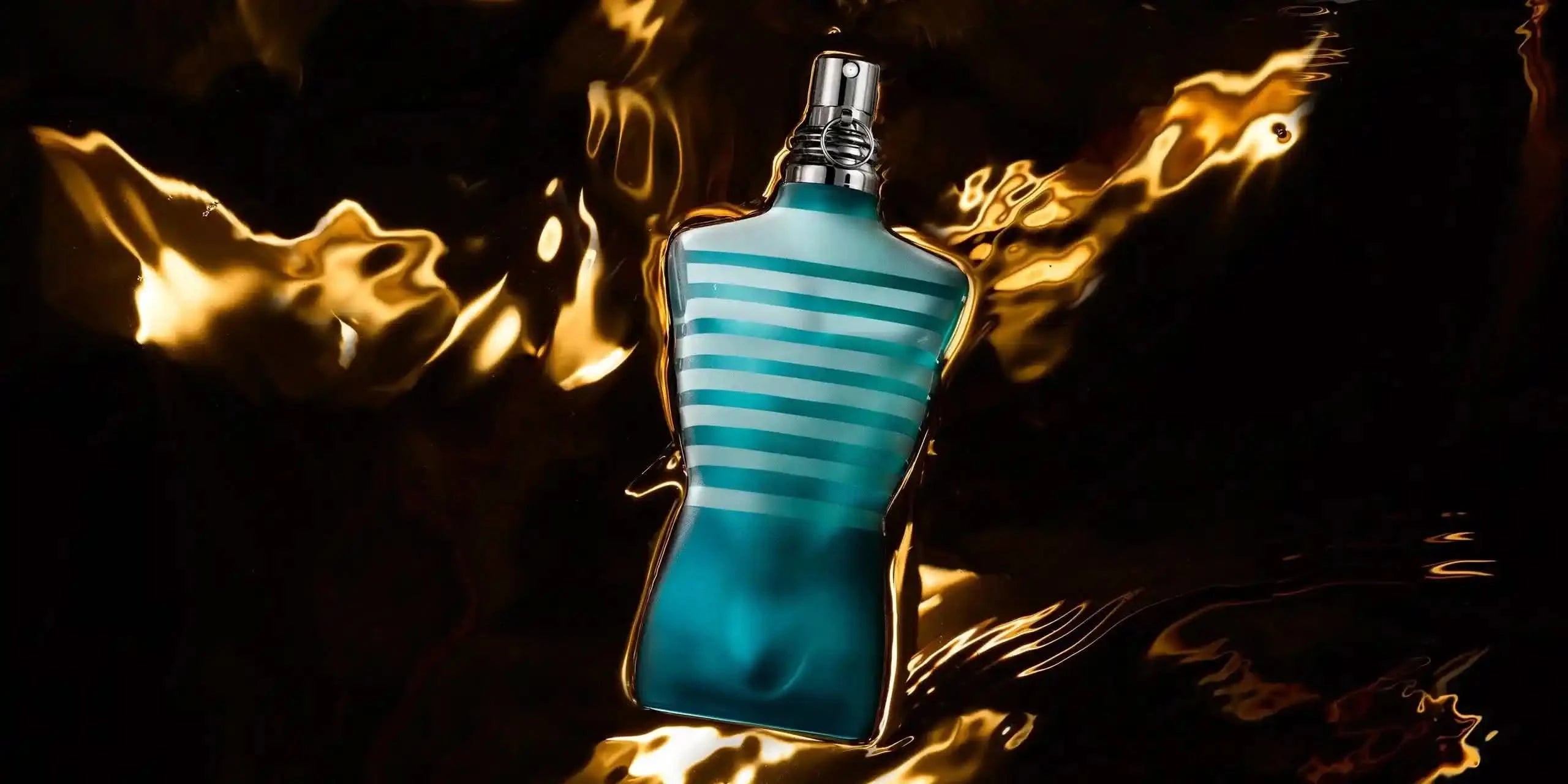 JPG Le Male EDT 125 ml bottle floating on golden liquid background, emphasizing the luxury and allure of this men's cologne.