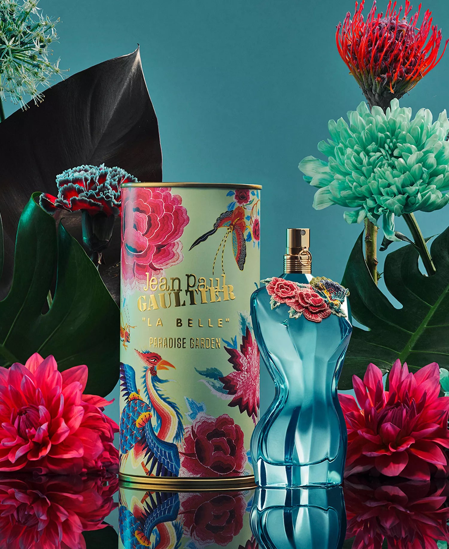 Jean Paul Gaultier La Belle Paradise Garden EDP in turquoise corset bottle with ornate collector tin featuring tropical birds and peony artwork