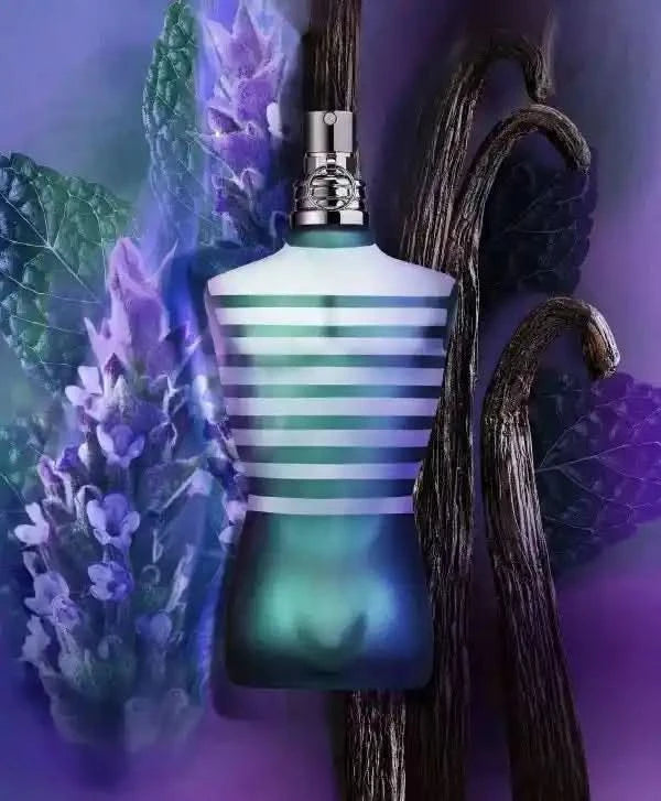 JPG Le Male EDT 4.2 oz bottle surrounded by mint, lavender, and vanilla, highlighting the fragrance's aromatic and fresh scent notes.