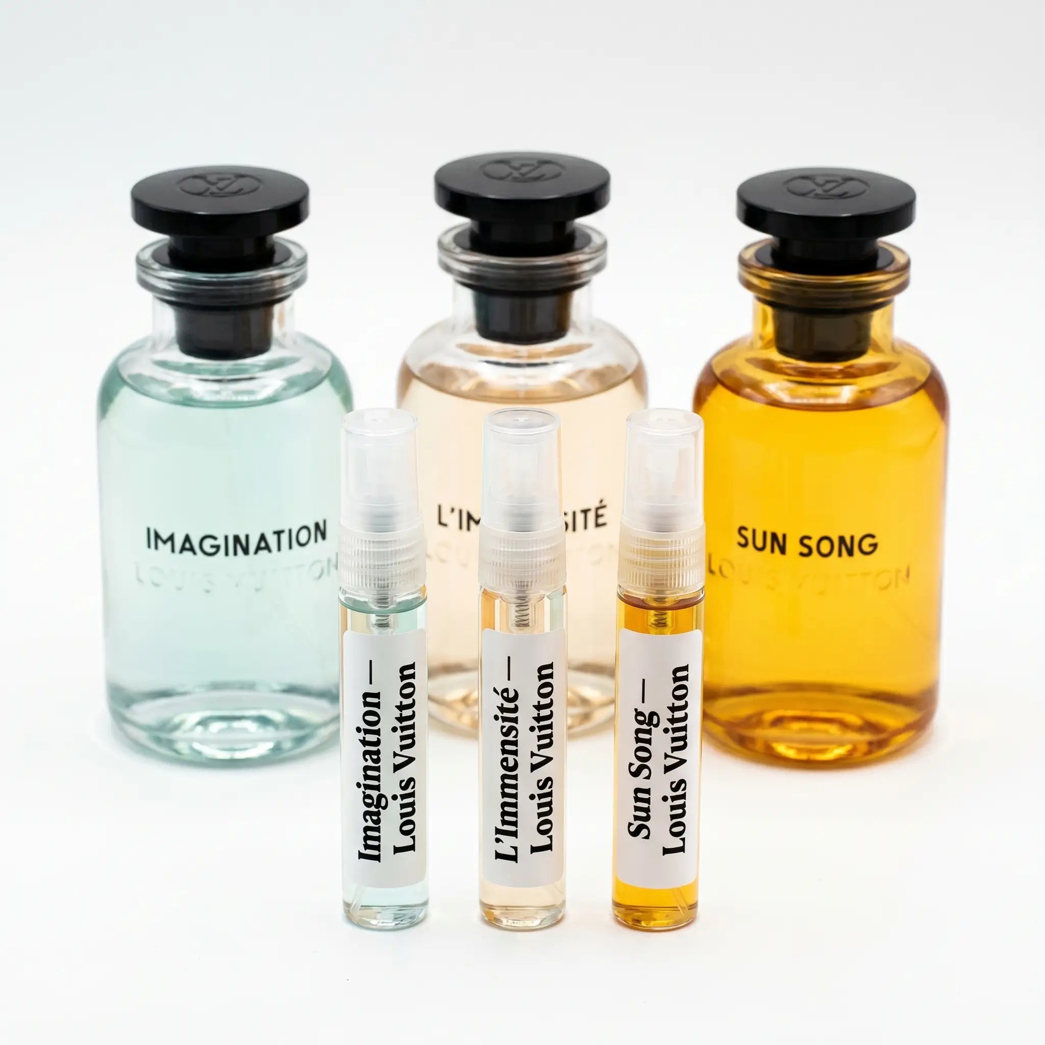 Louis Vuitton Discovery Set hero — Imagination, L'Immensité and Sun Song bottles with 5ml decants
