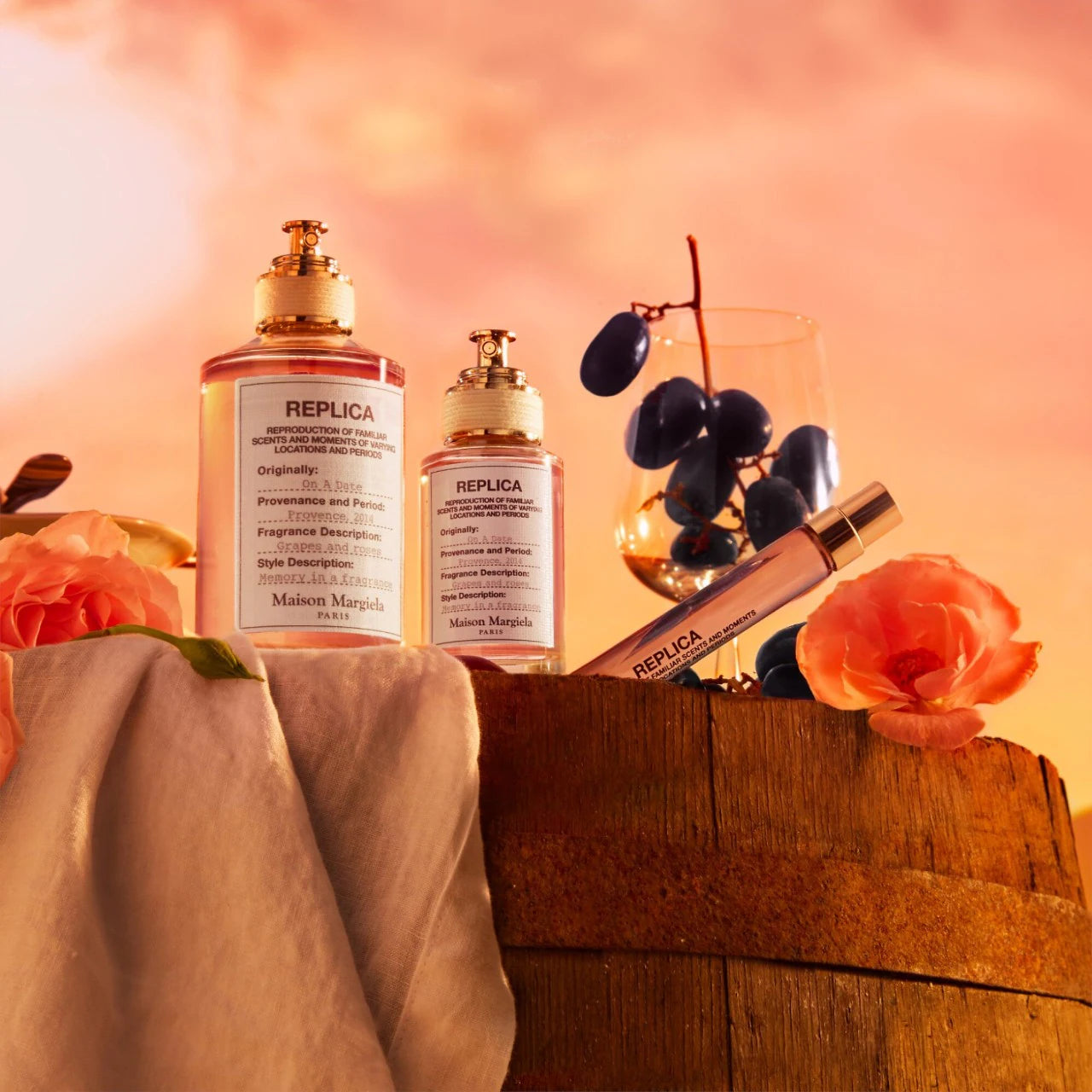 Replica perfume bottles and accessories on a wooden surface with a warm, blurred background.